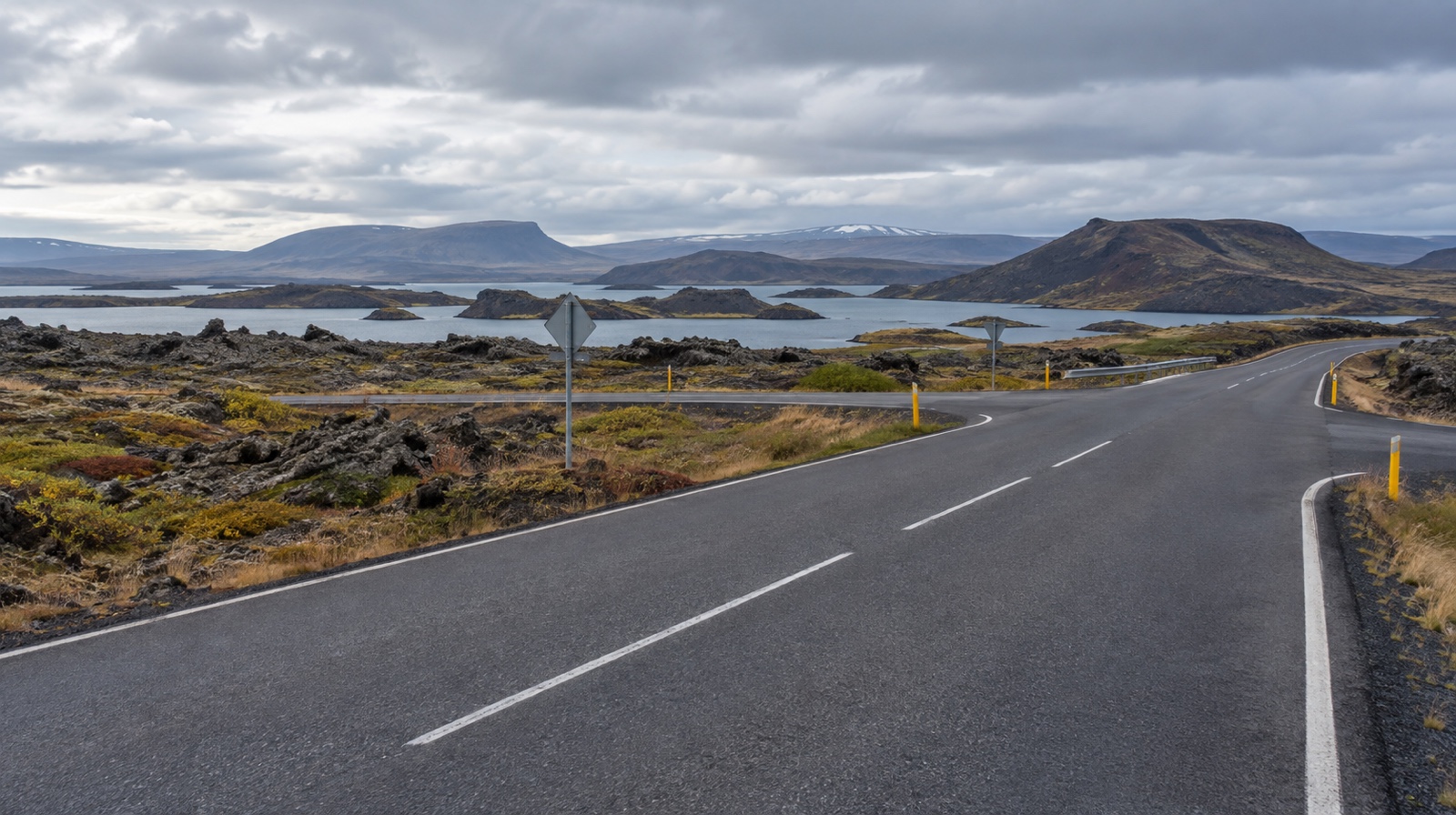 Road or signed junction linking two major Mývatn stops with volcanic terrain in context