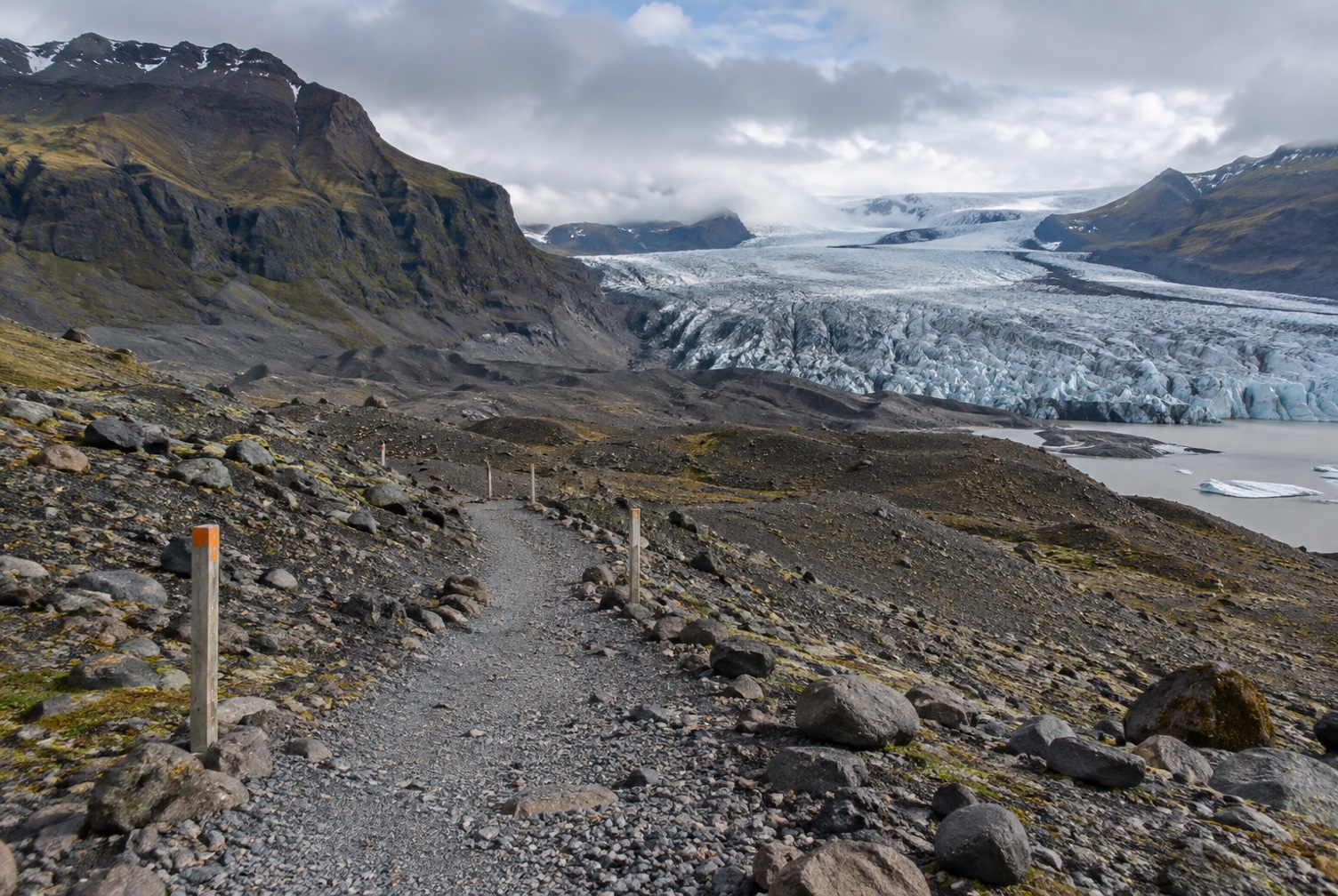 Skaftafell visitor-area trail and viewpoint with the glacier visible in the distance